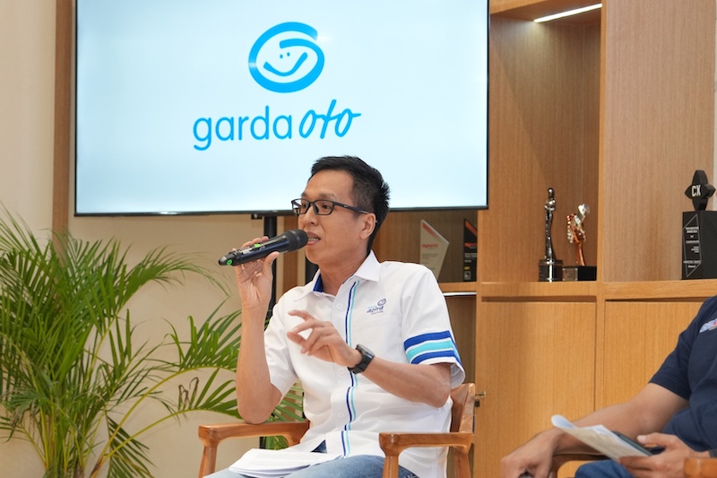 Astra Isuzu dan Garda Oto